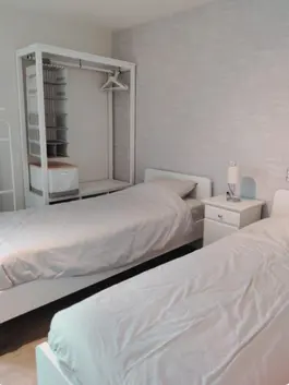 Slaapkamer met eenpersoonsbedden